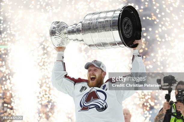 Gabriel Landeskog of the Colorado Avalanche lifts the Stanley Cup after defeating the Tampa Bay Lightning 2-1 in Game Six of the 2022 NHL Stanley Cup...