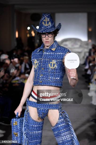 Model walks the runway during the Thom Browne Ready to Wear Spring/Summer 2023 fashion show as part of the Paris Men Fashion Week on June 26, 2022 in...