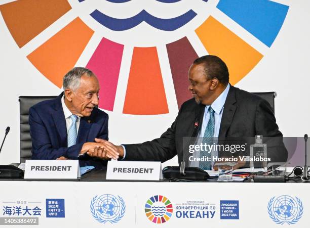 Co-Presidents of the Second UN Ocean Conference, Portuguese President Marcelo Rebelo de Sousa , and Kenyan President Uhuru Kenyatta , shake hands...