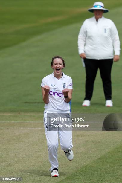 Kate Cross of England celebrates after bowling out Andrie Steyn of South Africa during Day One of the First Test Match between England Women and...