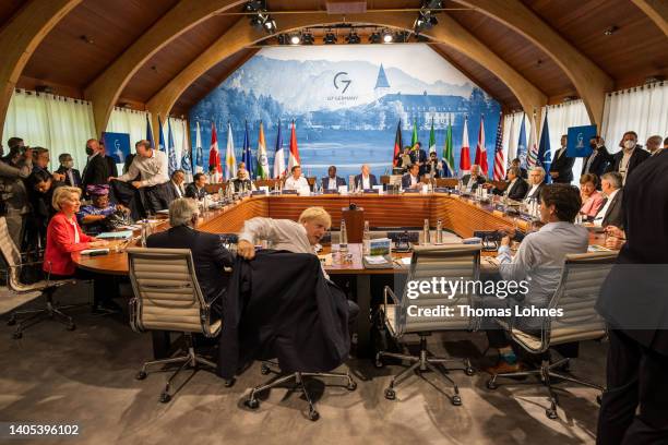 German Chancellor Olaf Scholz hosts the plenary sessions Outreach on the second day of the three-day G7 summit at Schloss Elmau on June 27, 2022 near...