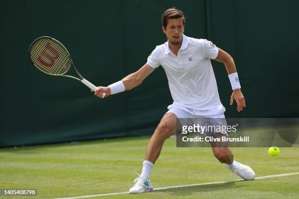 Aljaz Bedene of Slovenia plays a forehand against Maximilian Marterer of Germany during the Men's Singles First Round match during Day One of The...