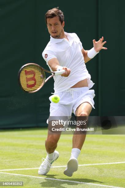 Aljaz Bedene of Slovenia plays a forehand against Maximilian Marterer of Germany during the Men's Singles First Round match during Day One of The...