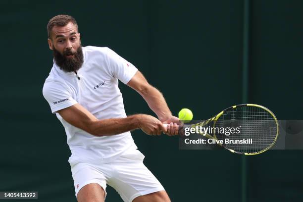 Benoit Paire of France plays a backhand against Quentin Halys of France during the Men's Singles First Round match during Day One of The...