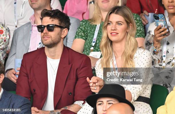 Joel Dommett and Hannah Cooper attend Day One of Wimbledon 2022 at the All England Lawn Tennis and Croquet Club on June 27, 2022 in London, England.