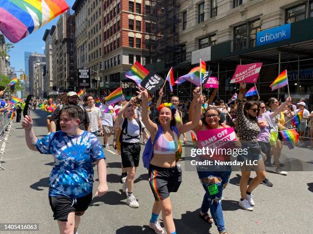 Destiny Sulima girlfriend Amber Caswell and their friend Daeja Alicea all of Bay Shore, New York, march with Planned Parenthood at the 2022 Pride...