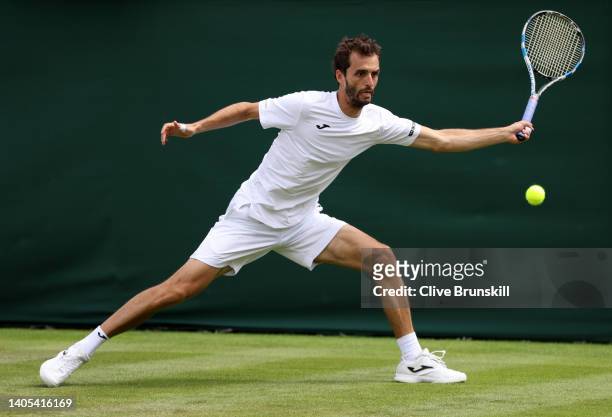 Albert Ramos-Vinolas of Spain plays a forehand against Casper Ruud of Norway during the Men's Singles First Round match during Day One of The...