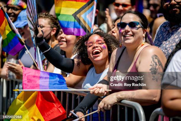 People in Pride colors attend and march during the 2022 New York City Pride March on June 26, 2022 in New York City.
