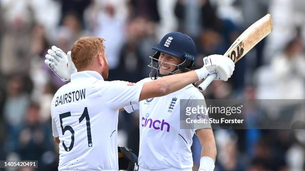 England batsmen Jonny Bairstow and Joe Root celebrate victory after day five of the third Test Match between England and New Zealand at Headingley on...