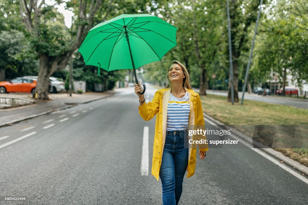 I love matching my umbrella and my raincoat