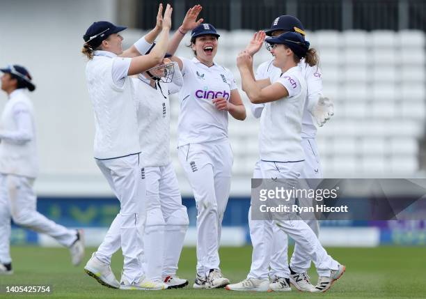 England celebrate after Emma Lamb catches out Anneke Bosch of South Africa during Day One of the First Test Match between England Women and South...