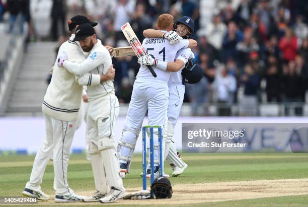 England batsmen Jonny Bairstow and Joe Root celebrate victory after day five of the third Test Match between England and New Zealand at Headingley on...