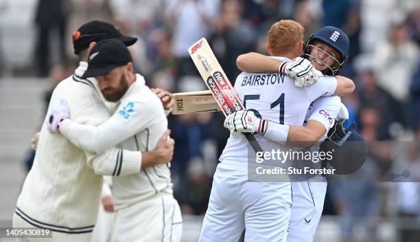 England batsmen Jonny Bairstow and Joe Root celebrate victory after day five of the third Test Match between England and New Zealand at Headingley on...