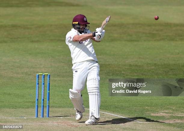Ben Sanderson of Northamptonshire pulls the ball to the boundary during the LV= Insurance County Championship match between Northamptonshire and...