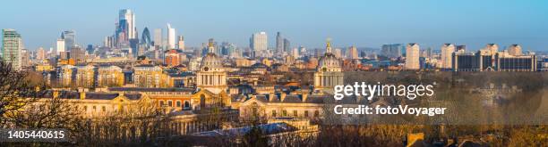 london panoramic view across rooftops to city skyscrapers at sunrise - greenwich london stock pictures, royalty-free photos & images