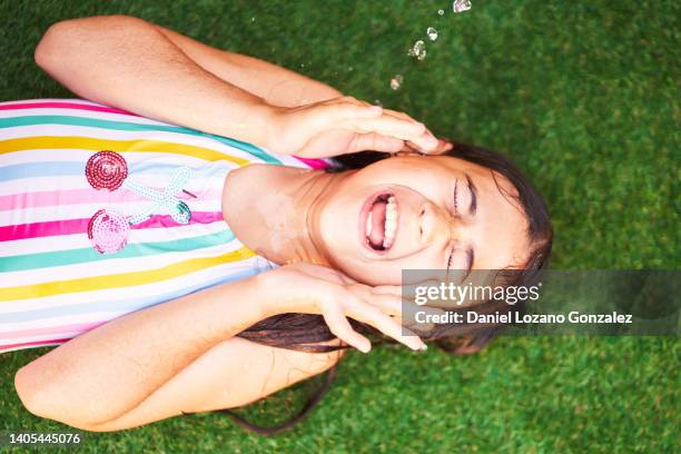 Falling Under Girl Lying Under Falling Water Drops High-Res Stock Photo - Getty Images