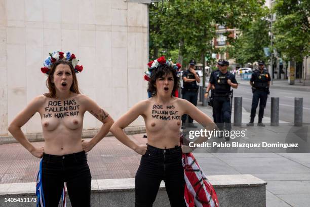 Activists with body paint reading 'Roe has fallen but we have not' demonstrate outside the US Embassy against the US Supreme Court decision to...