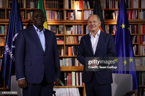 German Chancellor Olaf Scholz and Senegalese President Macky Sall arrive for a bilateral meeting following the Outreach working session on the second...