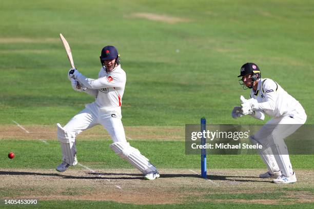 Keaton Jennings of Lancashire plays to the offside as wicketkeeper James Bracey of Gloucestershire looks on during day two of the LV= Insurance...