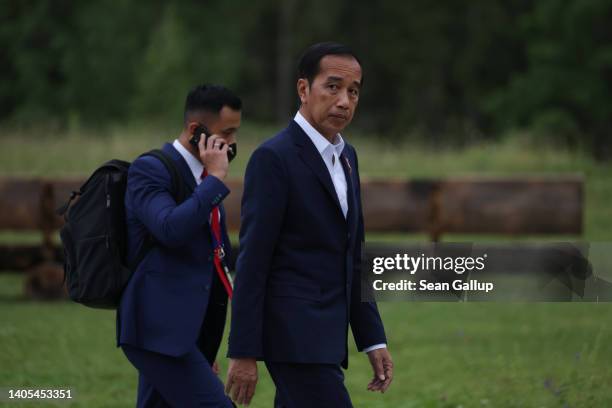 Indonesian President Joko Widodo walks following the Outreach working session on the second day of the G7 summit at Schloss Elmau on June 27, 2022...