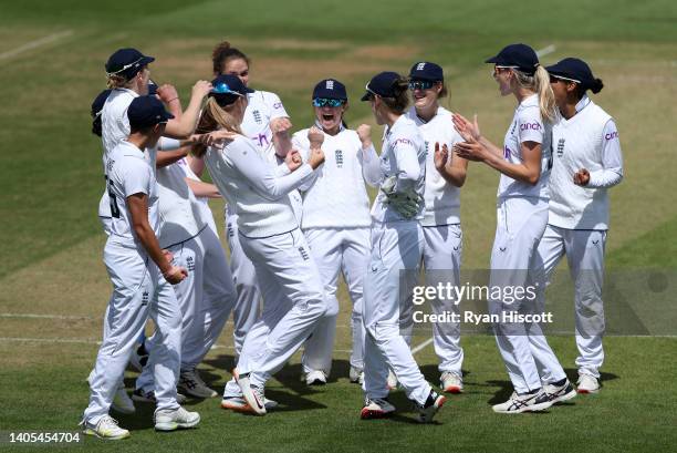 The England team celebrates after a review confirms Lara Goodall of South Africa is dismissed by leg-before-wicket off Nat Scriver of England during...