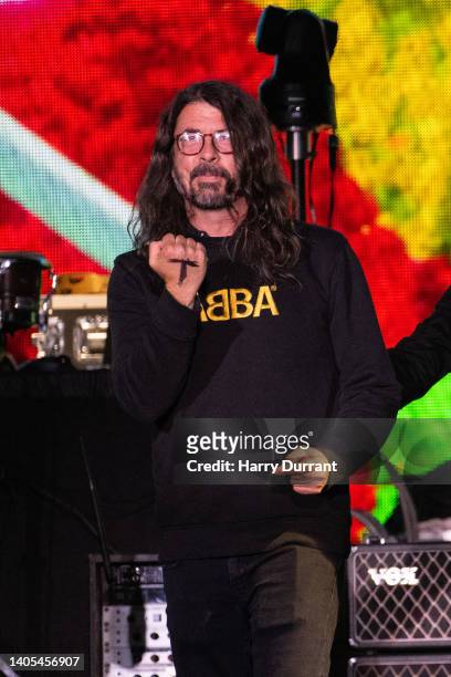 Dave Grohl takes to The Pyramid Stage to guest with Paul McCartney during day four of Glastonbury Festival at Worthy Farm, Pilton on June 25, 2022 in...