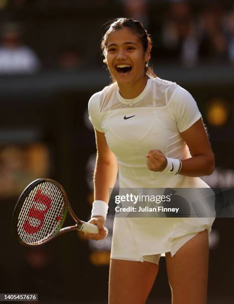 Emma Raducanu of Great Britain celebrates victory against Alison Van Uytvanck of Belgium in the Women's Singles First Round match during Day One of...