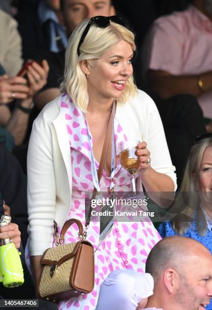 Holly Willoughby enjoys the Lanson Champagne suite during day one of Wimbledon 2022 at the All England Lawn Tennis and Croquet Club on June 27, 2022...