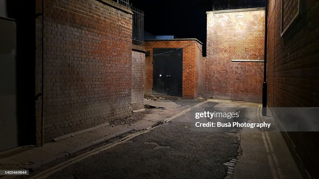 Dark back alley at night