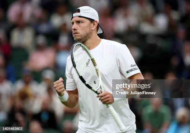 James Duckworth of Australia celebrates a point against Andy Murray of Great Britain during Men's Singles First Round match during Day One of The...