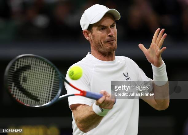 Andy Murray of Great Britain plays a forehand against James Duckworth of Australia during Men's Singles First Round match during Day One of The...