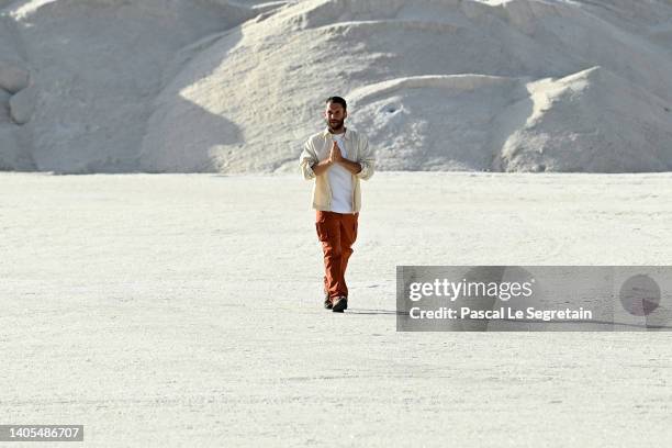 Designer Simon Porte Jacquemus walks the runway during the "Le Papier " Jacquemus' Fashion Show on June 27, 2022 in Arles, France.