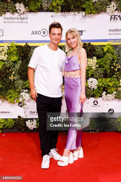 Louis Held and Lina Larissa Strahl arrive for the 72nd Lola - German Film Award at Palais am Funkturm on June 24, 2022 in Berlin, Germany.