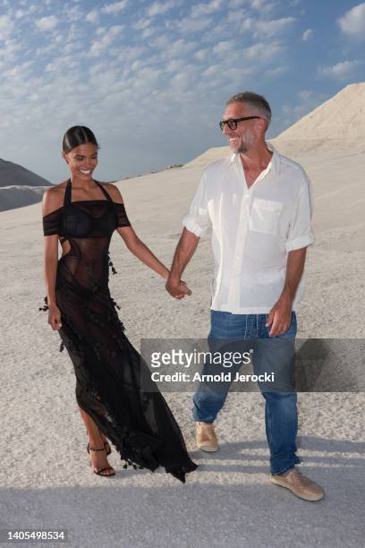 Tina Kunakey and Vincent Cassel attends the "Le Papier " Jacquemus' Fashion Show on June 27, 2022 in Arles, France.