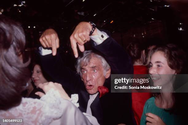 Composer Leonard Bernstein dances at an I Love NY party at Regines nightclub in New York City on January 15, 1979.