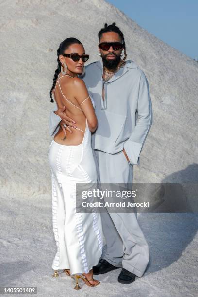 Amina Muaddi and Fary attends the "Le Papier " Jacquemus' Fashion Show on June 27, 2022 in Arles, France.