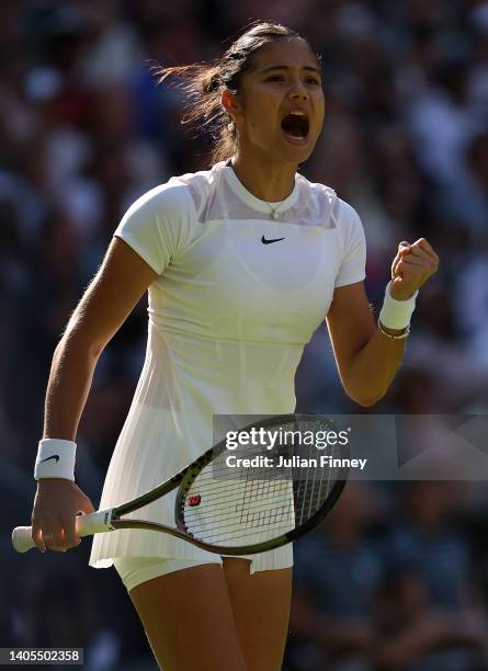 Emma Raducanu of Great Britain celebrates her win against Alison Van Uytvanck of Belgium in the Women's Singles First Round match during Day One of...