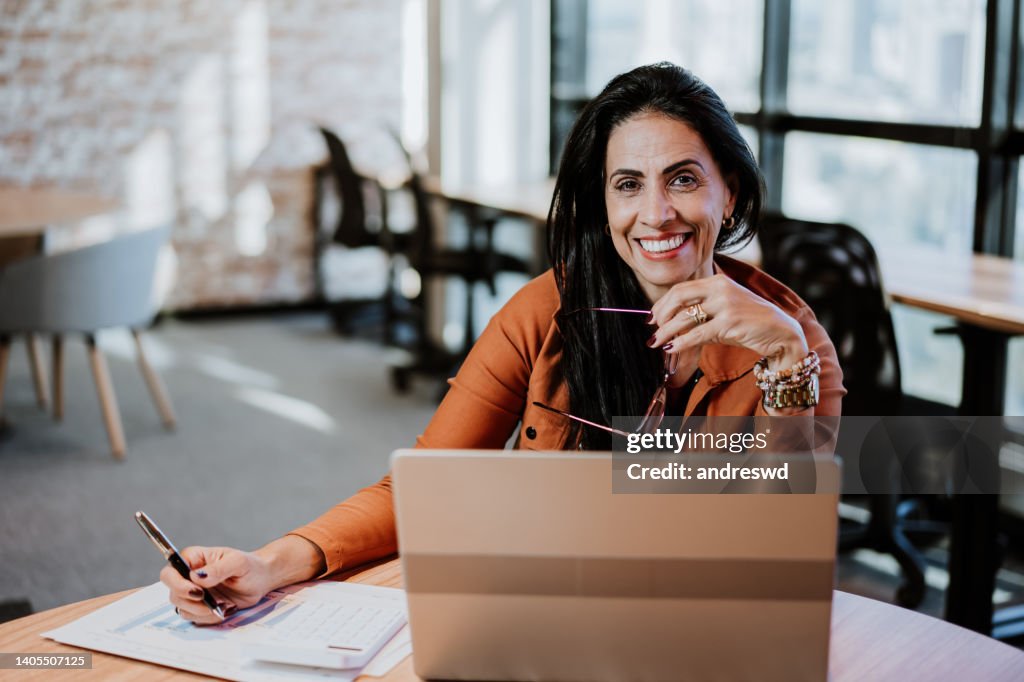 Businesswoman using laptop