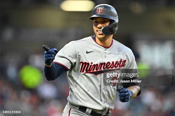 Carlos Correa of the Minnesota Twins celebrates after hitting a two-run homer during the seventh inning against the Cleveland Guardians at...
