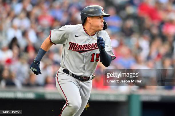 Gio Urshela of the Minnesota Twins runs out an RBI double during the fourth inning against the Cleveland Guardians at Progressive Field on June 27,...