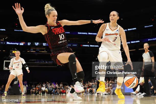 Diana Taurasi of the Phoenix Mercury handles the ball against Lexie Hull of the Indiana Fever during the second half of the WNBA game at Footprint...