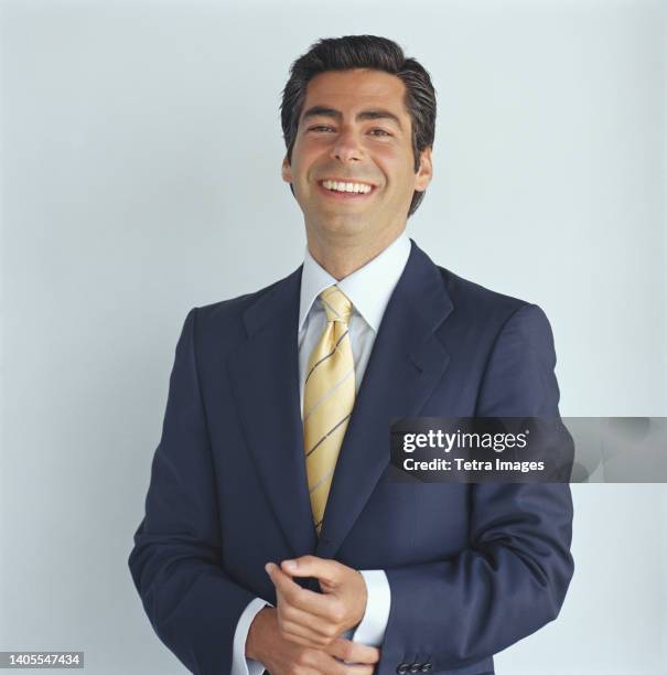 portrait of smiling businessman - suit and tie stock pictures, royalty-free photos & images