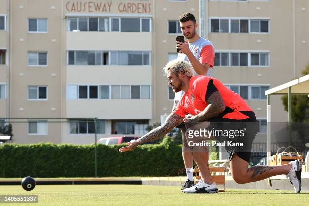 Jack Nowell plays lawn bowls against Jamie George following an England Rugby media opportunity at the Perth & Tattersalls Bowls Club on June 28, 2022...