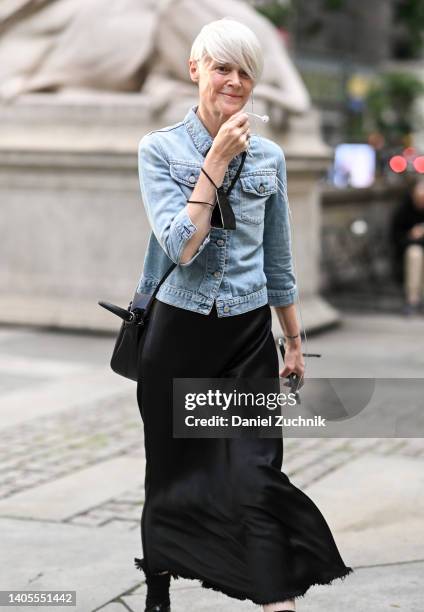 Kate Lanphear is seen wearing a jean jacket and black skirt outside the Marc Jacobs show on June 27, 2022 in New York City.