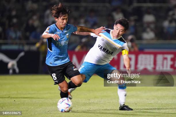 Kento Tachibanada of Kawasaki Frontale and Rikiya Uehara of Jubilo Iwata compete for the ball during the J.LEAGUE Meiji Yasuda J1 18th Sec. Match...