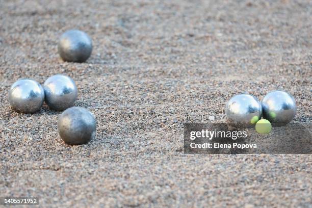petanque ball boules on petanque field - petanque court stock pictures, royalty-free photos & images