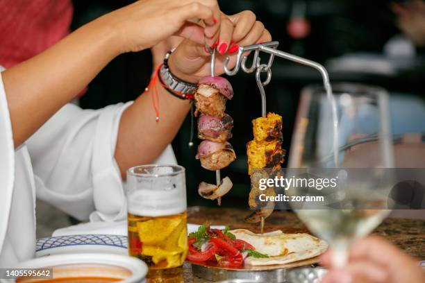 Skewer Example 117 Hanging Skewer Stock Photos, High-Res Pictures, and Images - Getty ...