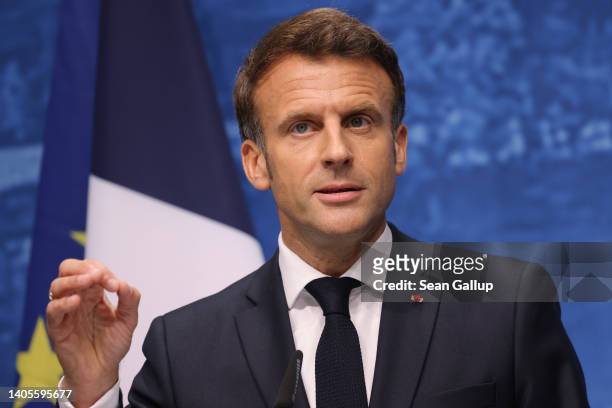 French President Emmanuel Macron speaks to the media on the third and final day of the nearby G7 summit at Schloss Elmau on June 28, 2022 near...