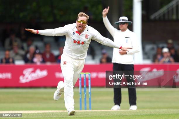 Simon Harmer of Essex celebrates taking the wicket of James Fuller of Hampshire during the LV= Insurance County Championship match between Essex vs...