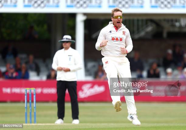 Simon Harmer of Essex celebrates taking the wicket of James Fuller of Hampshire during the LV= Insurance County Championship match between Essex vs...